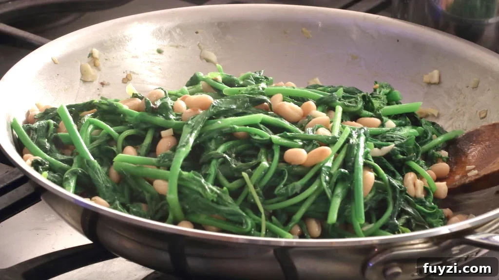 Fresh broccoli rabe on a cutting board