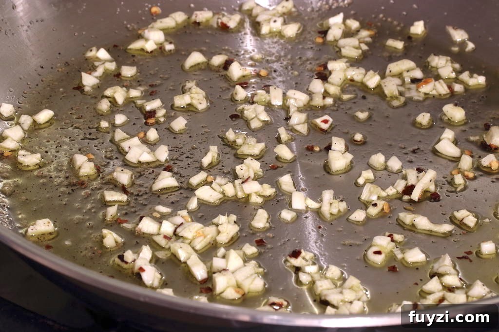 Garlic, peppers, and salt in olive oil