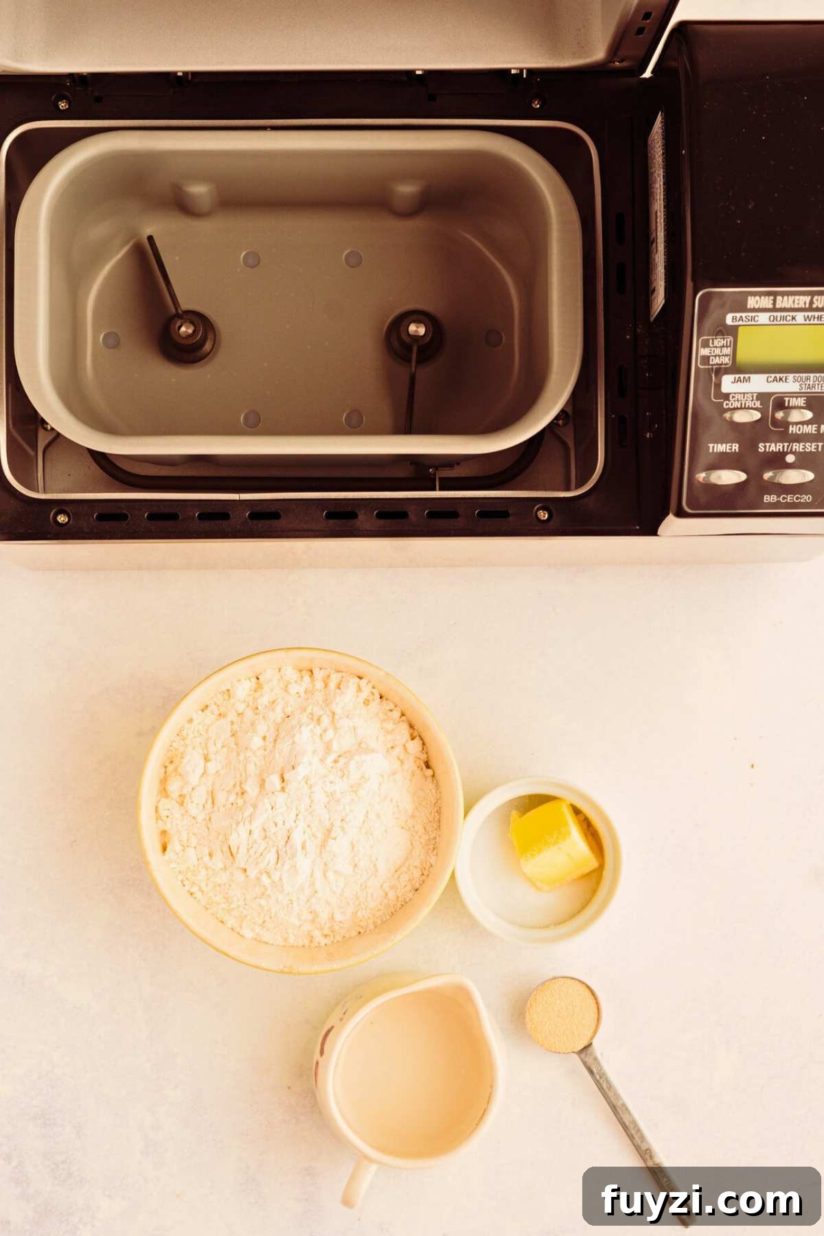 overhead shot of bread machine and ingredients measured out.